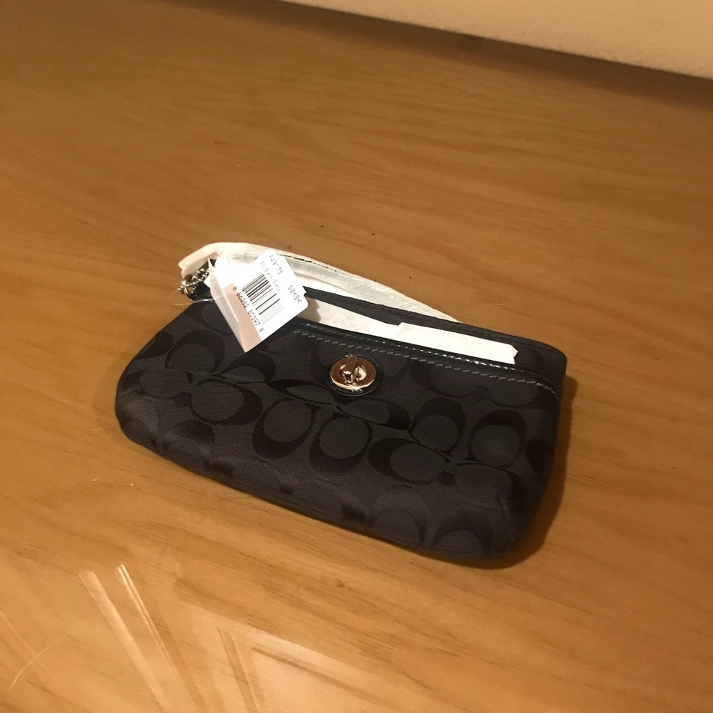 Brand new with tags Coach mini wristlet